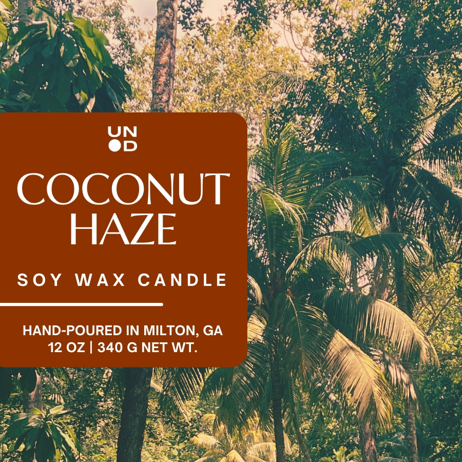 Coconut Haze soy wax candle label with a tropical background