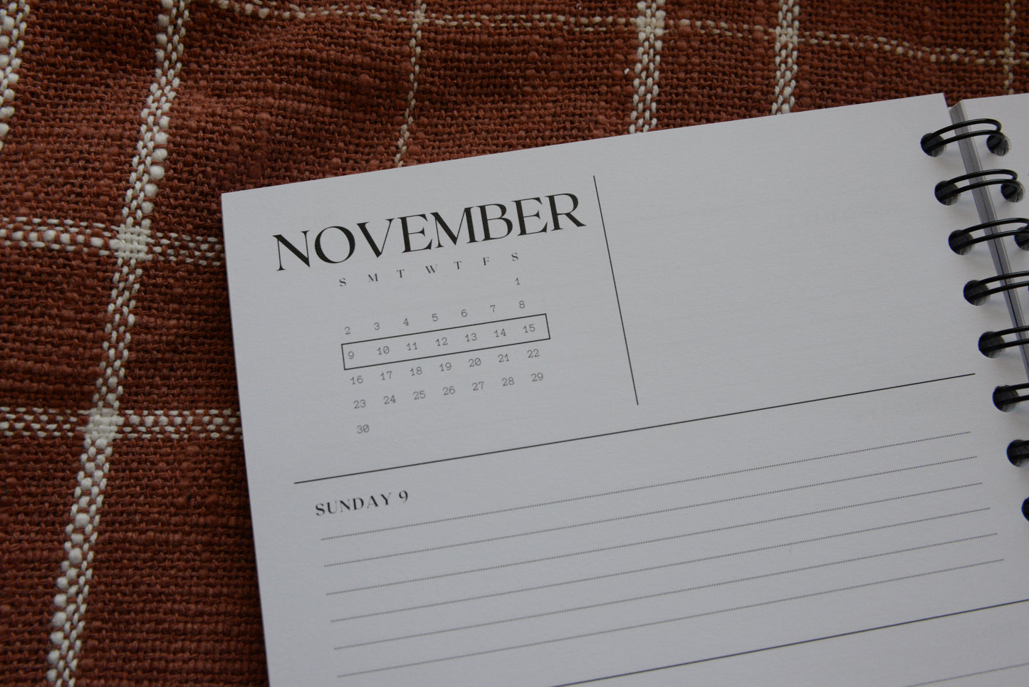 November Weekly view. Calendar view with sticky note area. Burnt Orange plaid background