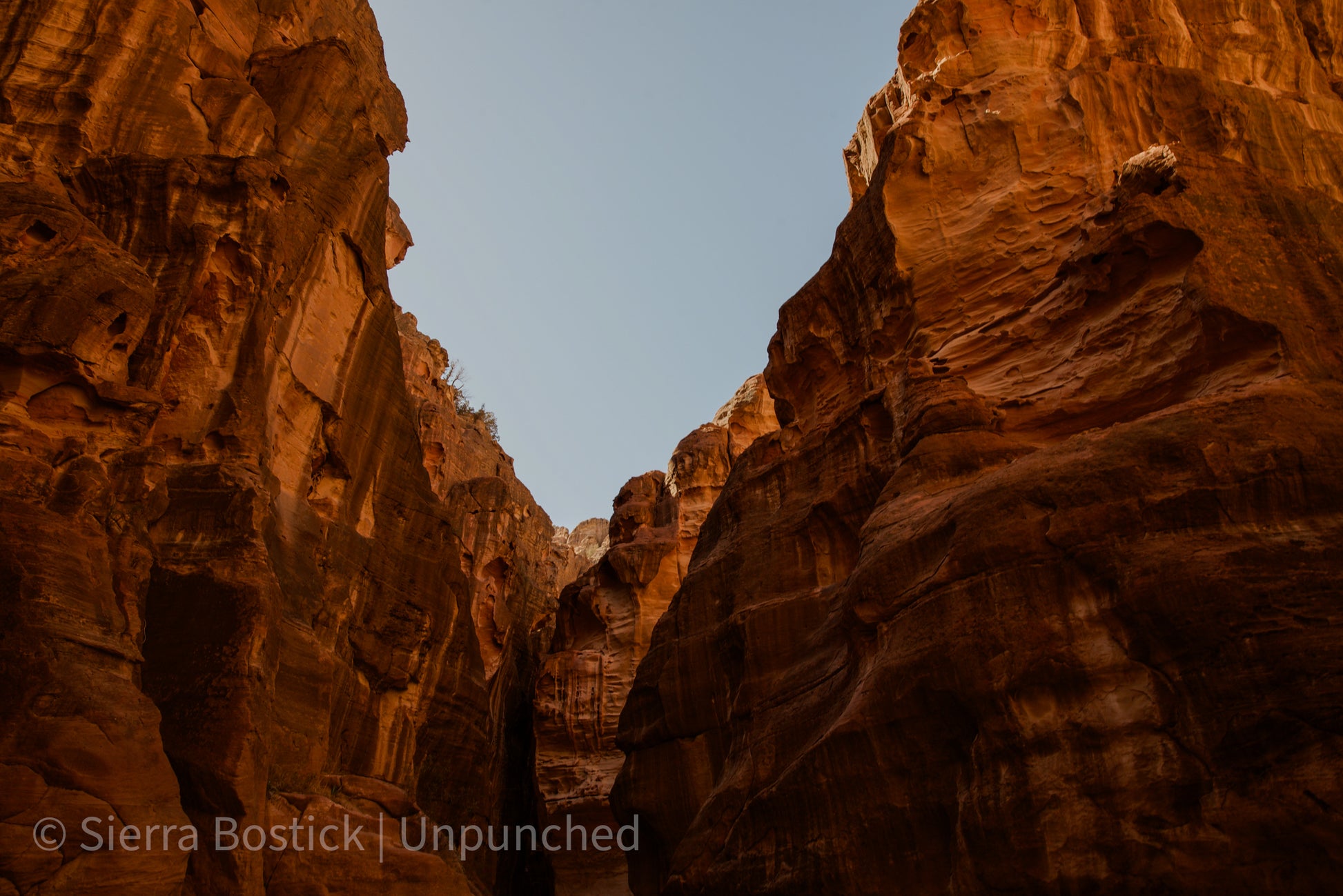 Al Siq Canyon in Jordan, orange from the light. 