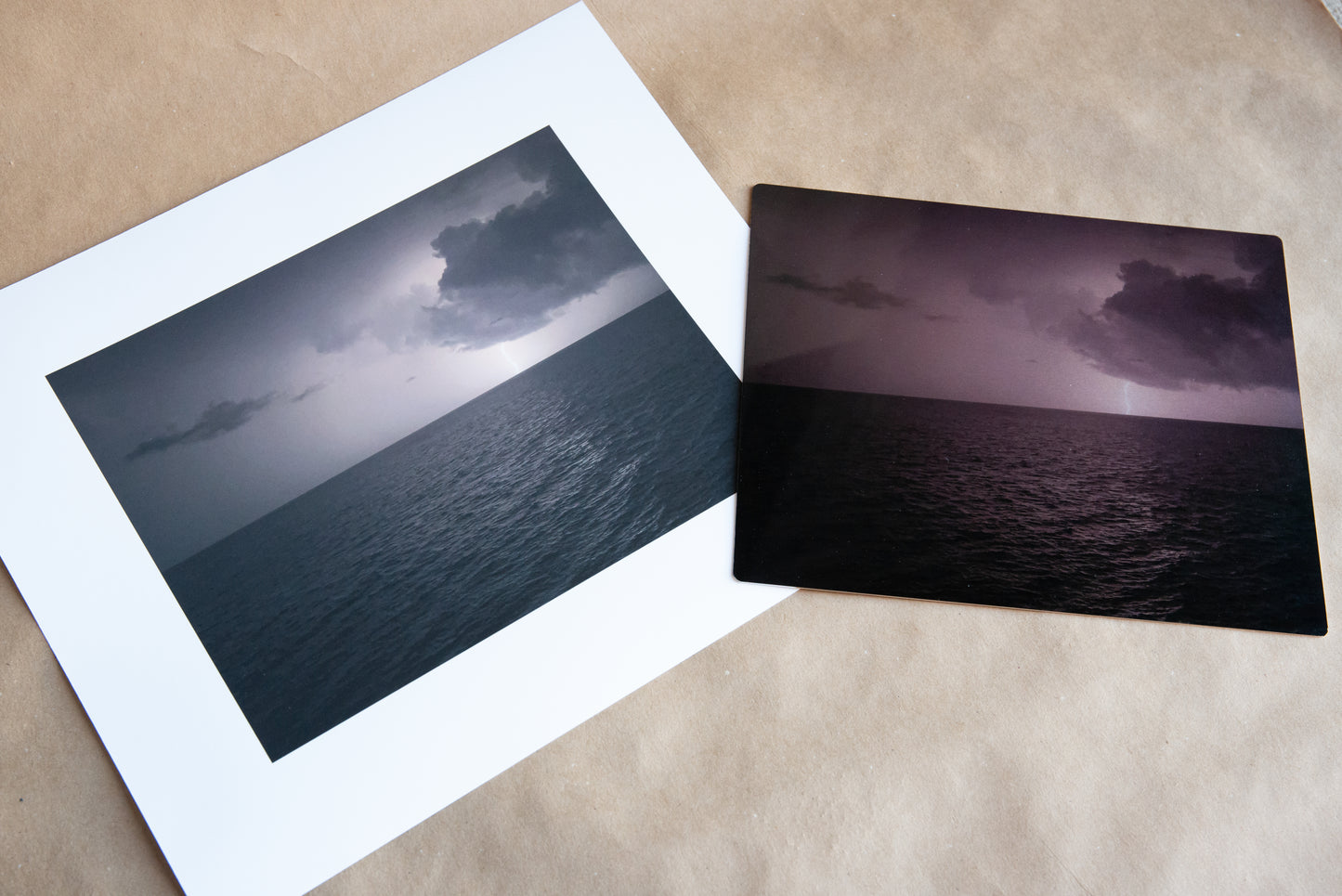 Photo of the a thunderstorm in Bahama waters. Printed on metal and paper mediums.