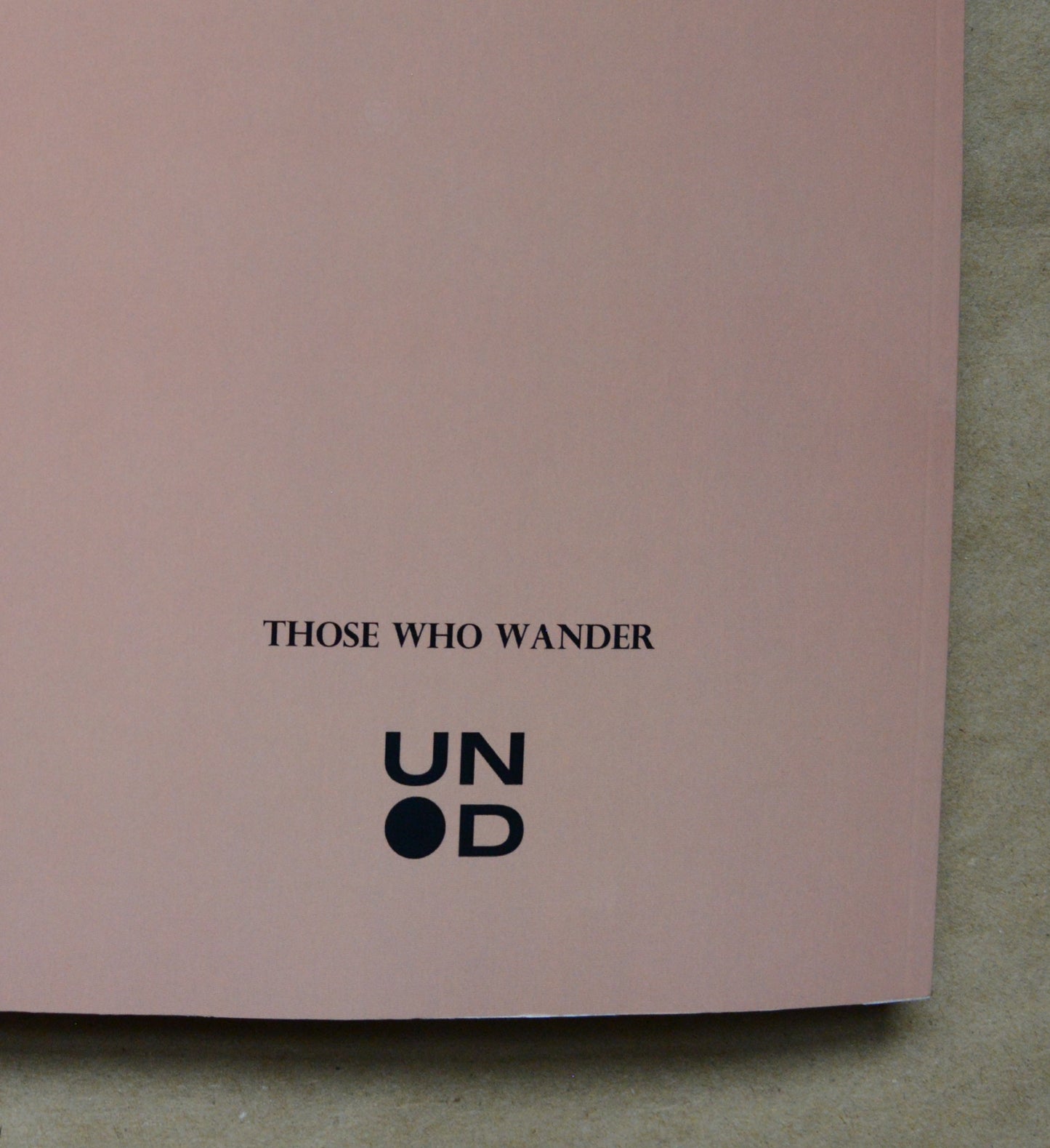 back cover with 'Those Who Wander' and unpunched logo on the back