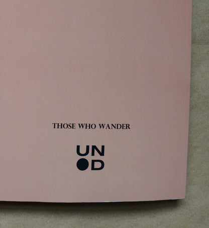 back cover with 'Those Who Wander' and unpunched logo on the back