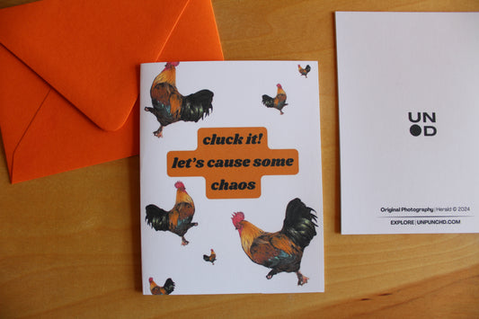 orange envelopes with cluck it card front and back view