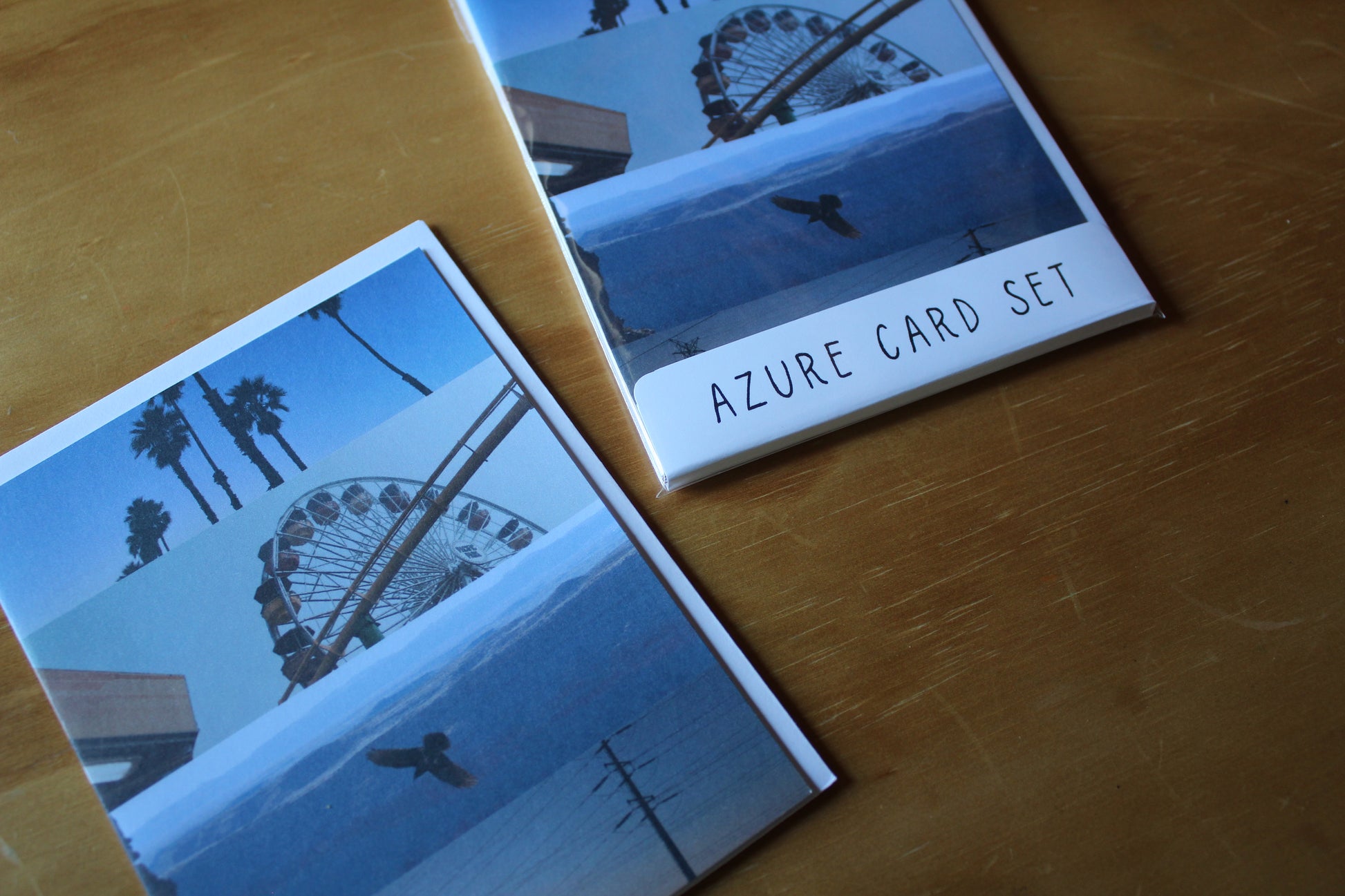 azure card set - 4 images with palm trees, ferris wheel, bird and electric horizon