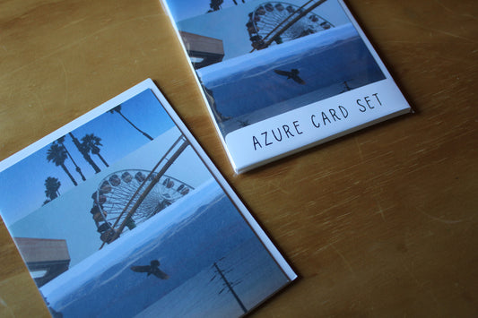 azure card set - 4 images with palm trees, ferris wheel, bird and electric horizon