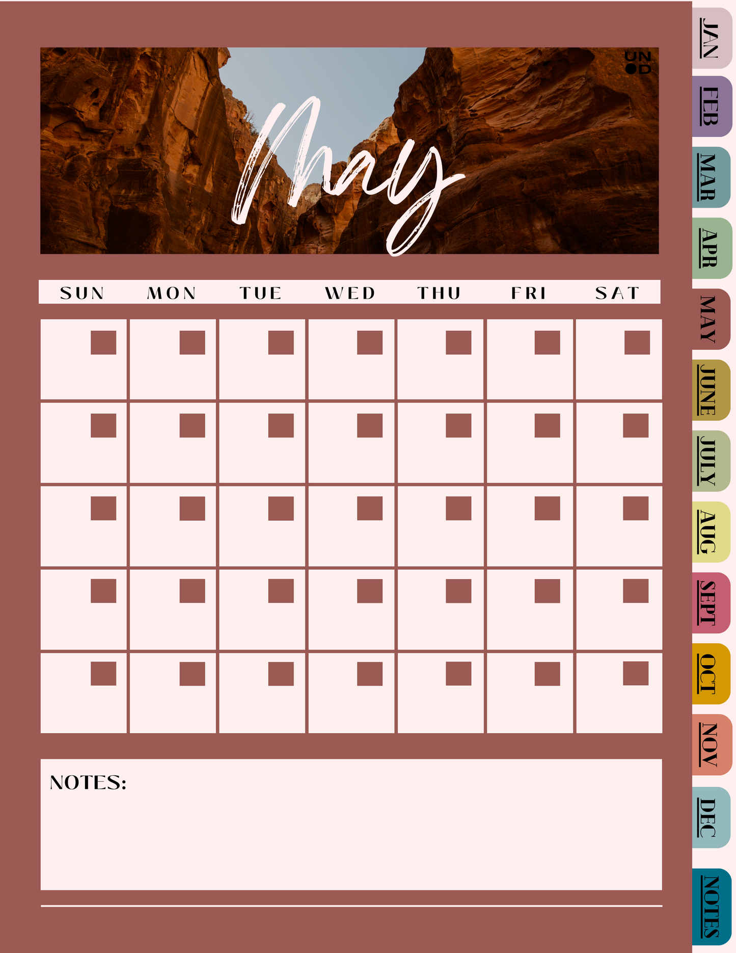 May monthly page. 5 weeks with the date boxes. a name of the week bar. May written over a canyon picture. notes bar at the bottom with tabs of the months on the side in varying colors with a notes tab