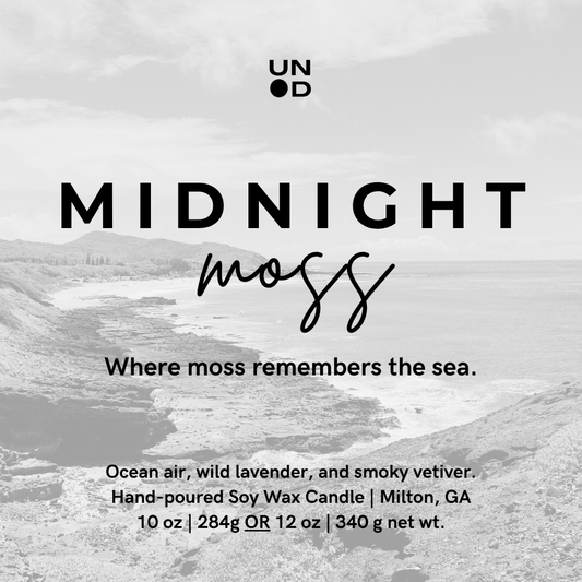 Candle label for 'Midnight Moss' with mountain landscape background
