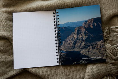 beige background spiral dot grid on left, right side image of grand canyon (tan, brown and blue) with desiccation | grand canyon, az